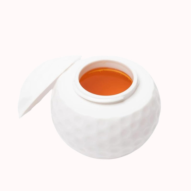 Kreativt snapsglas i form av en golfboll