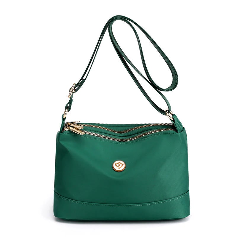 Minimalistisk axel- och crossbodyväska i nylon med stor kapacitet