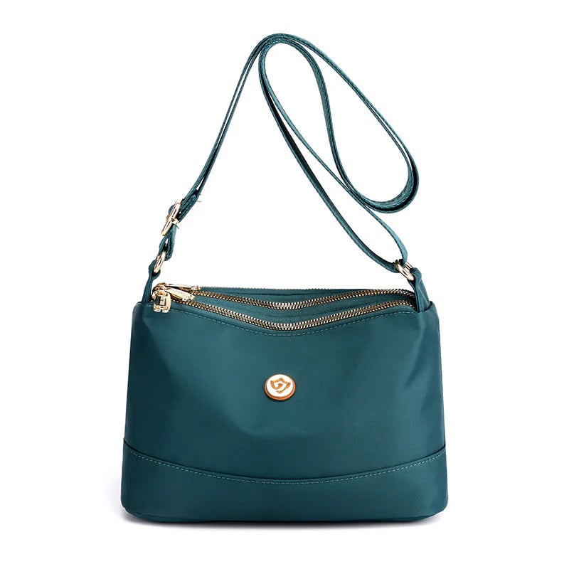 Minimalistisk axel- och crossbodyväska i nylon med stor kapacitet