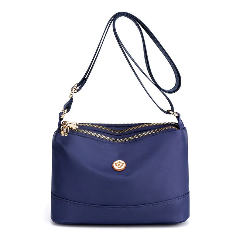 Minimalistisk axel- och crossbodyväska i nylon med stor kapacitet