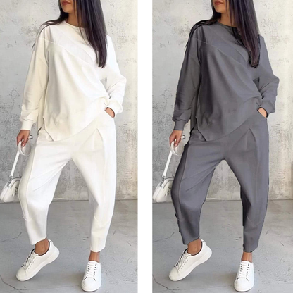 Set med långärmade sweatshirts och byxor med oregelbunden nederkant för kvinnor