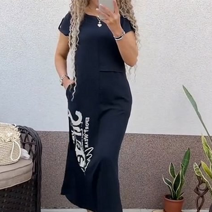 Avslappnad kortärmad klänning med sidoslits och lös passform för kvinnor