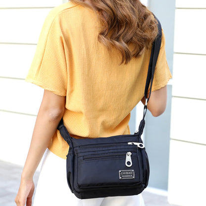 🔥🎁Vattentät Crossbody-väska Dam Casual Messenger Axelväskor Handväska för resor dagligen