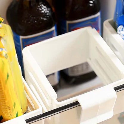 Justerbar skillevæg til køleska